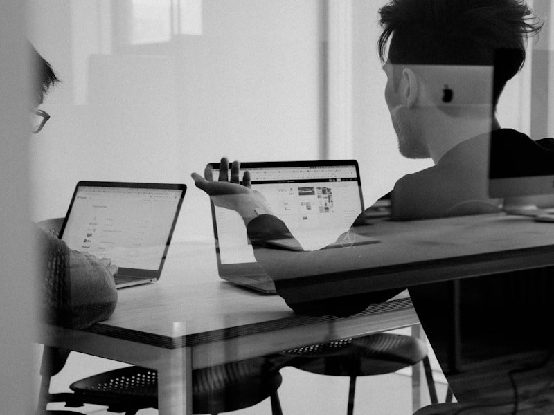 Technology team in a strategy meeting working on process optimization and engineering workflow alignment